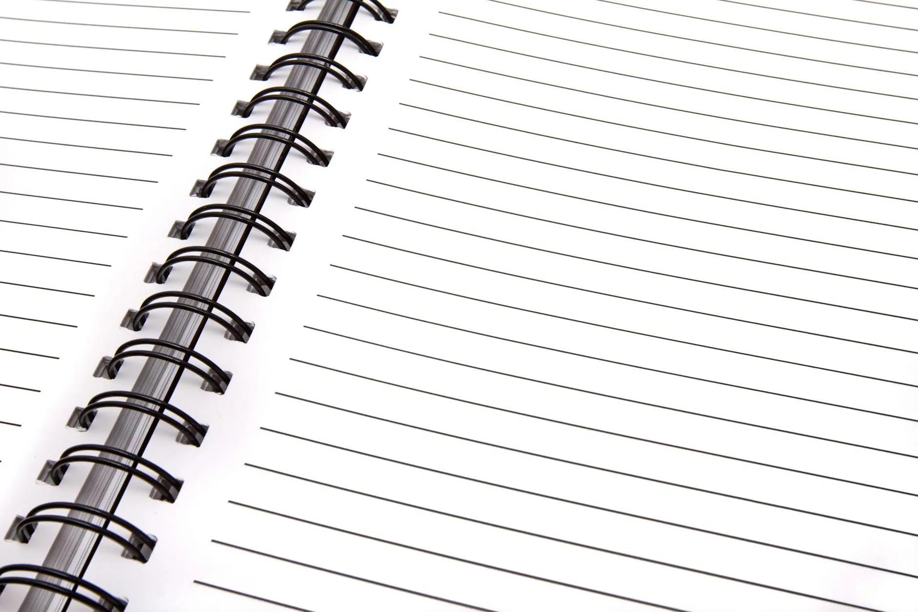 Open spiral notebook with lined pages, perfect for notes and planning.
